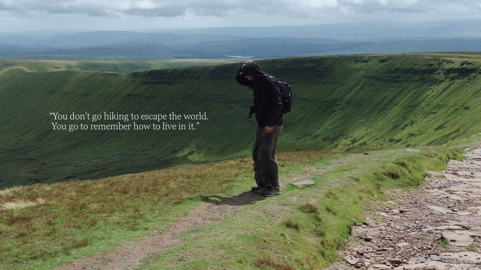 Treatment page with the line: You don't go hiking to escape the world. You go to remember how to live in it.